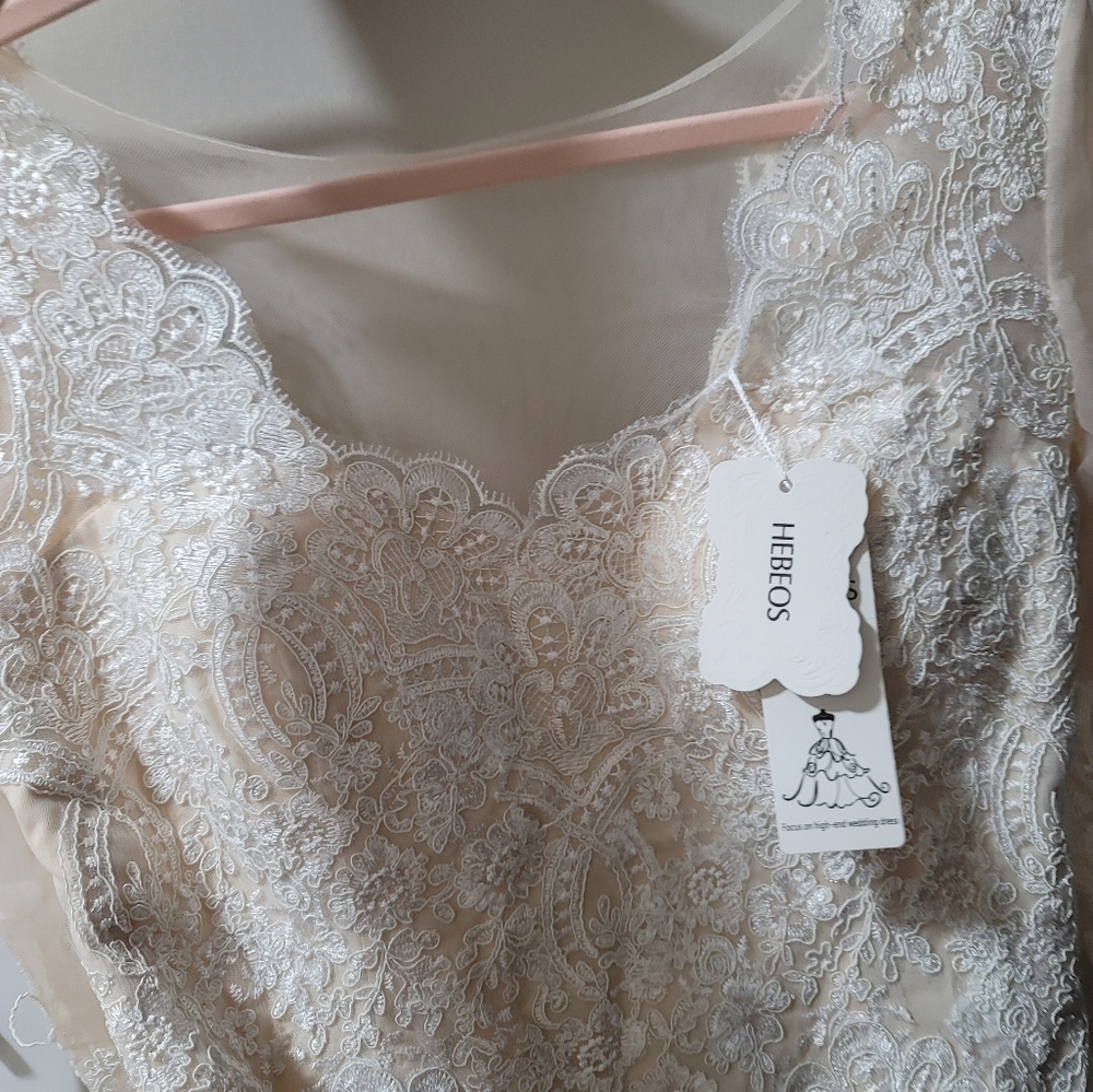 Hebo NWT size 10 wedding dress.